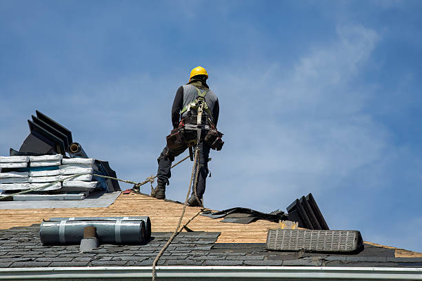 Professional Roof Replacement technician working in New Lisbon, WI